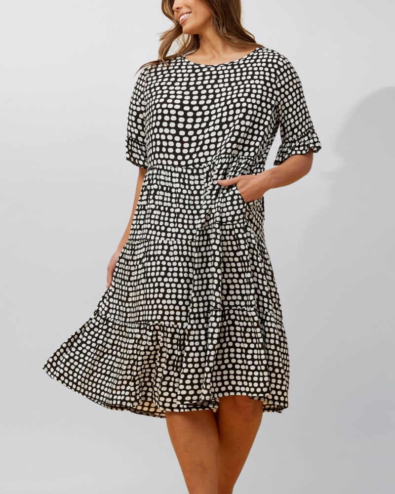 Front of a model wearing a size 3X Vanessa Midi Dress A-Line Polka Dot Tiered Skirt in Black by ANNICK. | dia_product_style_image_id:352475